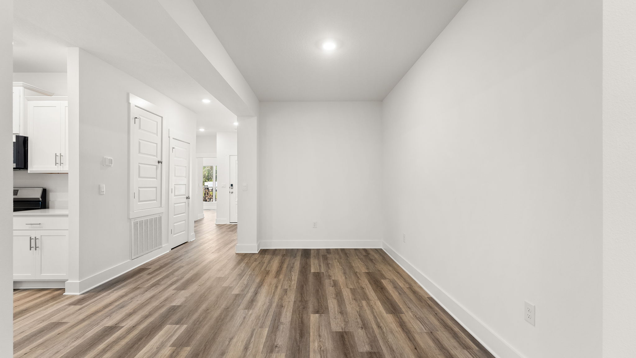 Designed as a dedicated space with columns separating it from the main living area