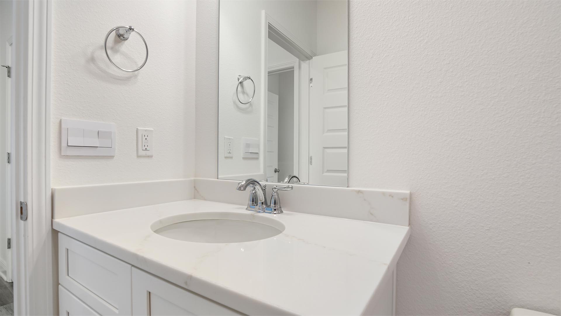 Shared bathroom with single vanity