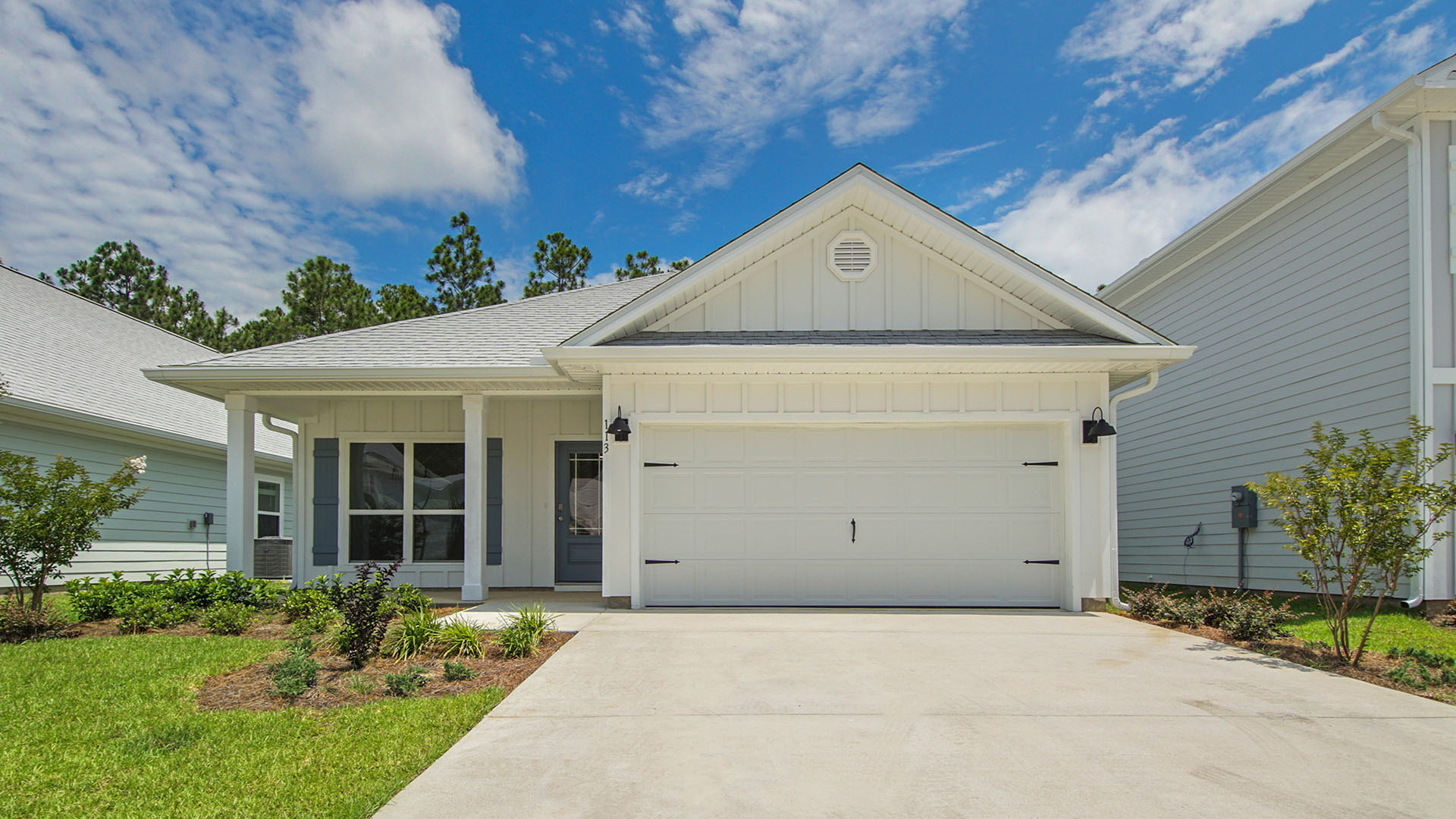 422 Wolcott Way is under construction. The exterior features Hardie siding a covered entry and front porch and a two car garage