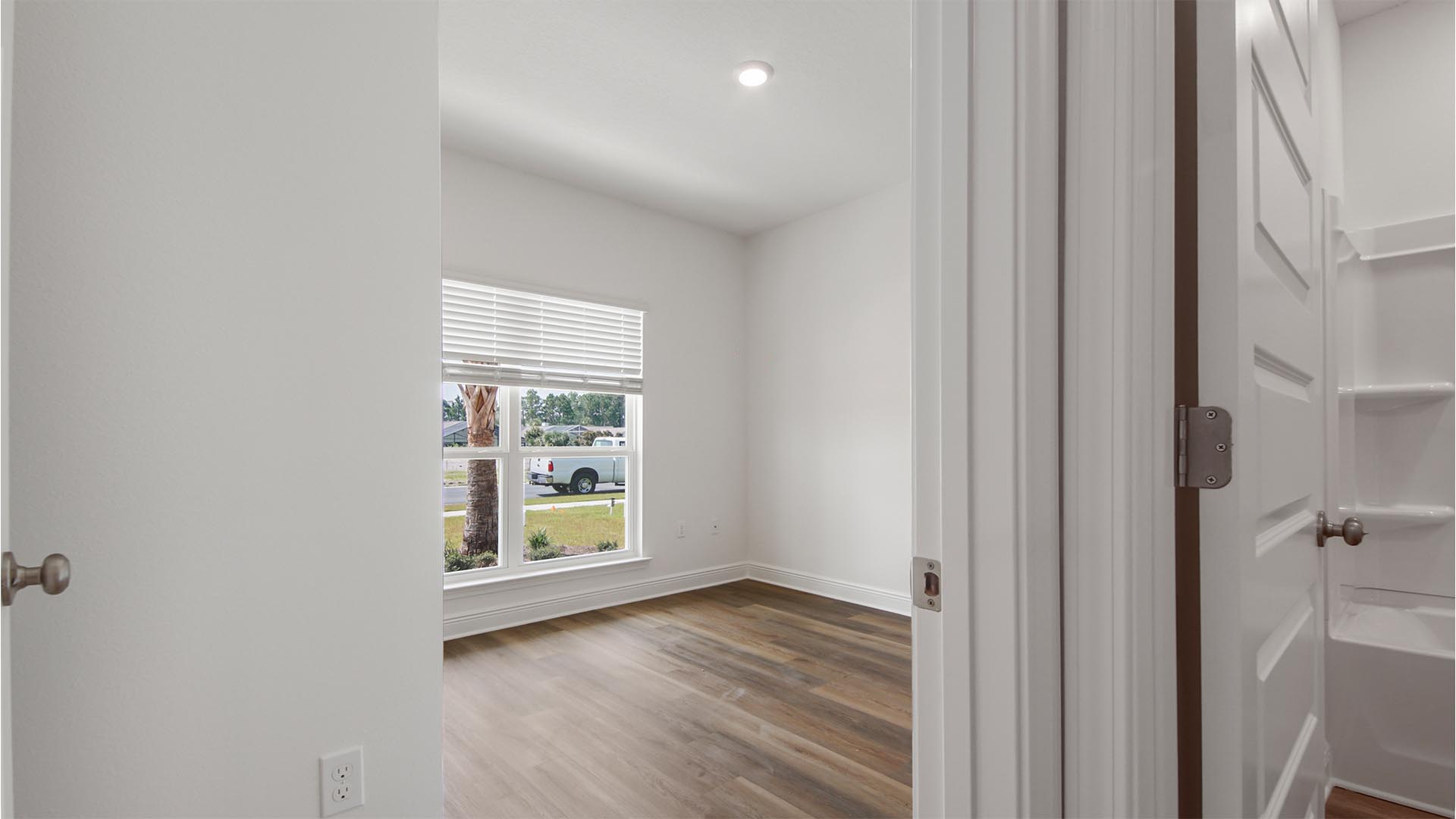 Entry to bedroom two which is located overlooking the front lawn