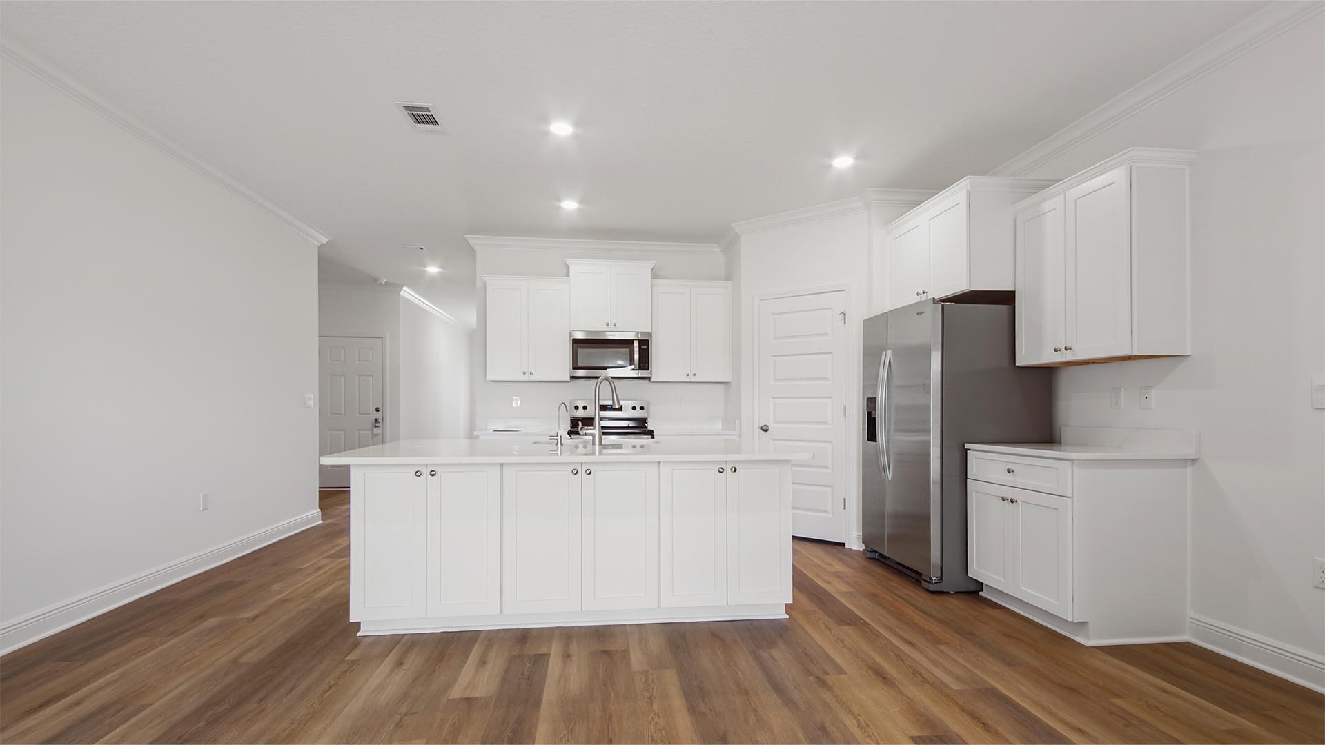 The kitchen has a center island