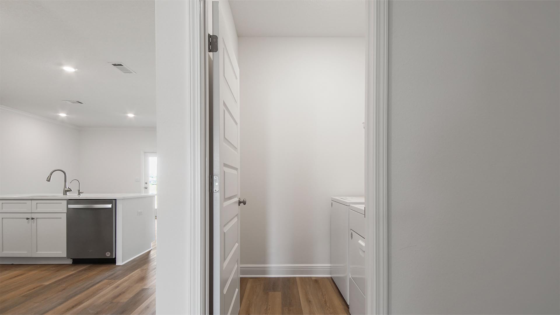 The laundry room is near bedroom four