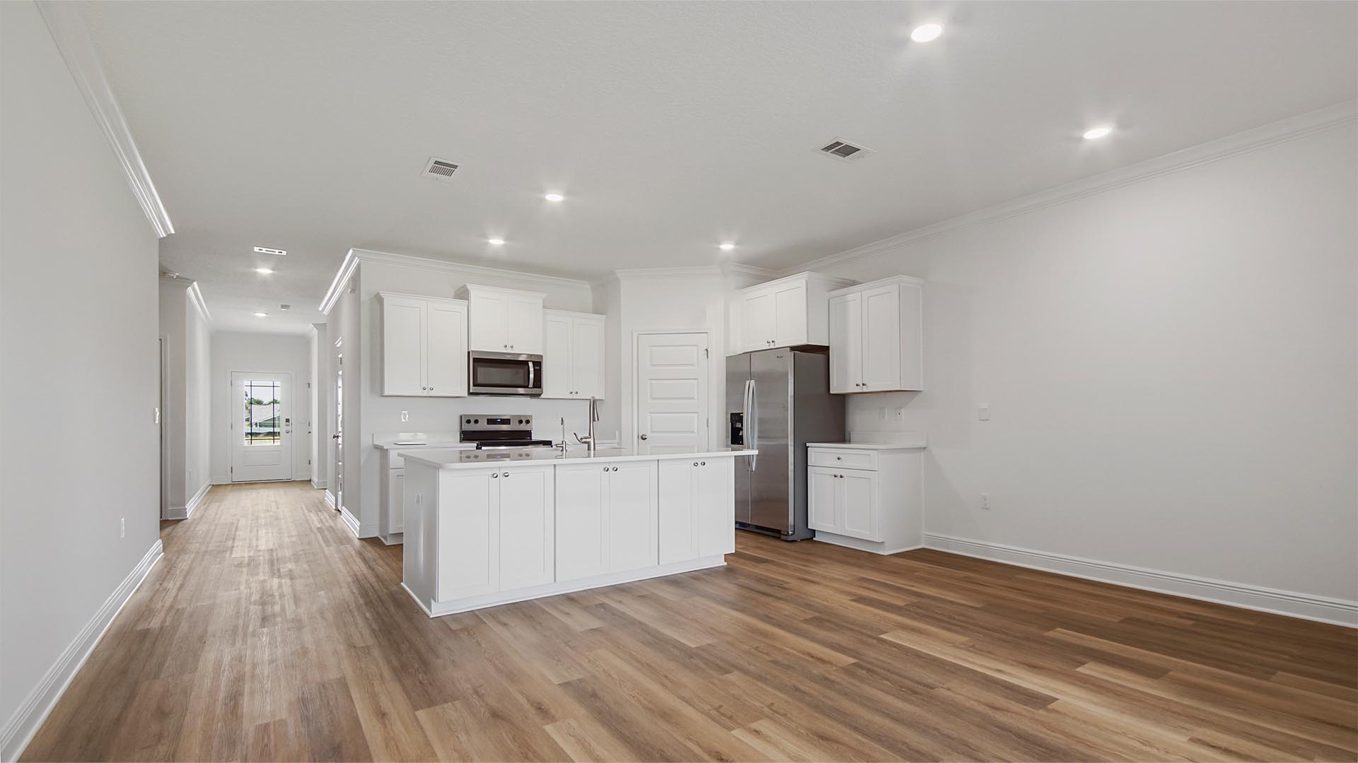 The Rhett is an open concept design with center island in kitchen