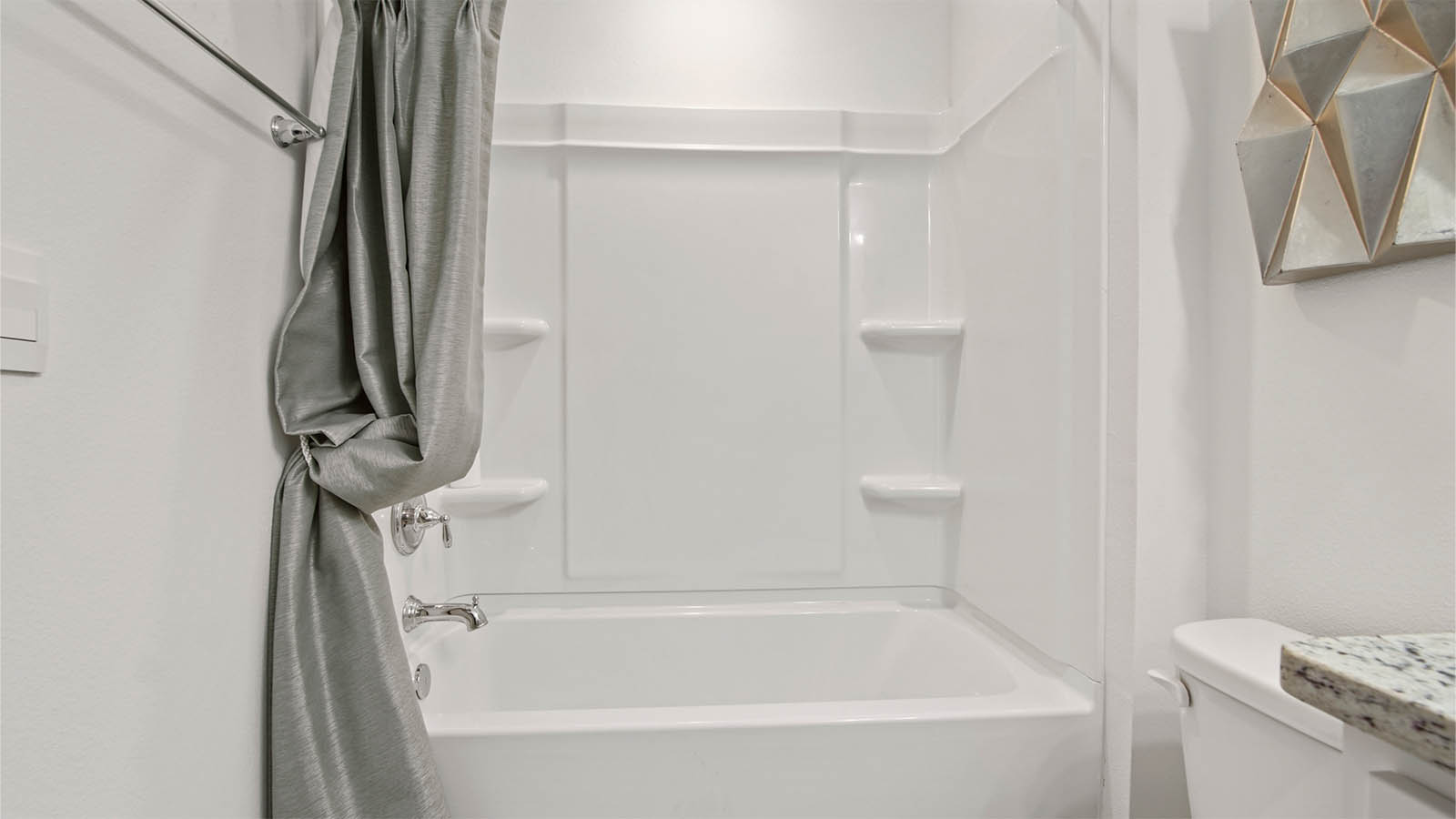 Shared bath on second level with shower/tub combo
