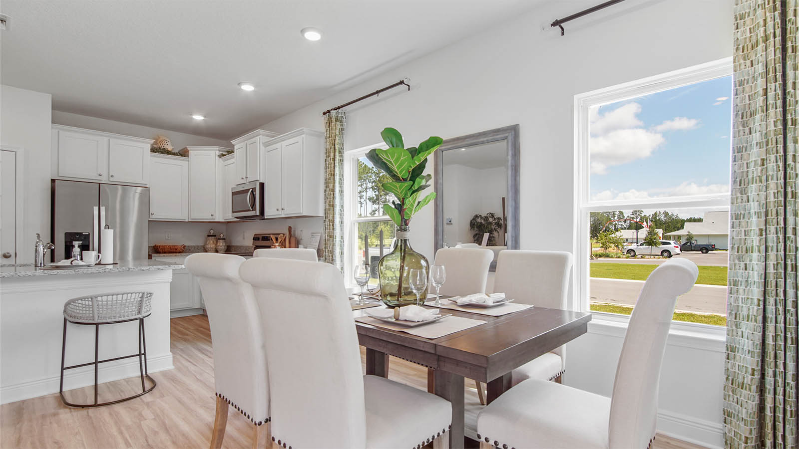 Dining area with windows allowing for natural light