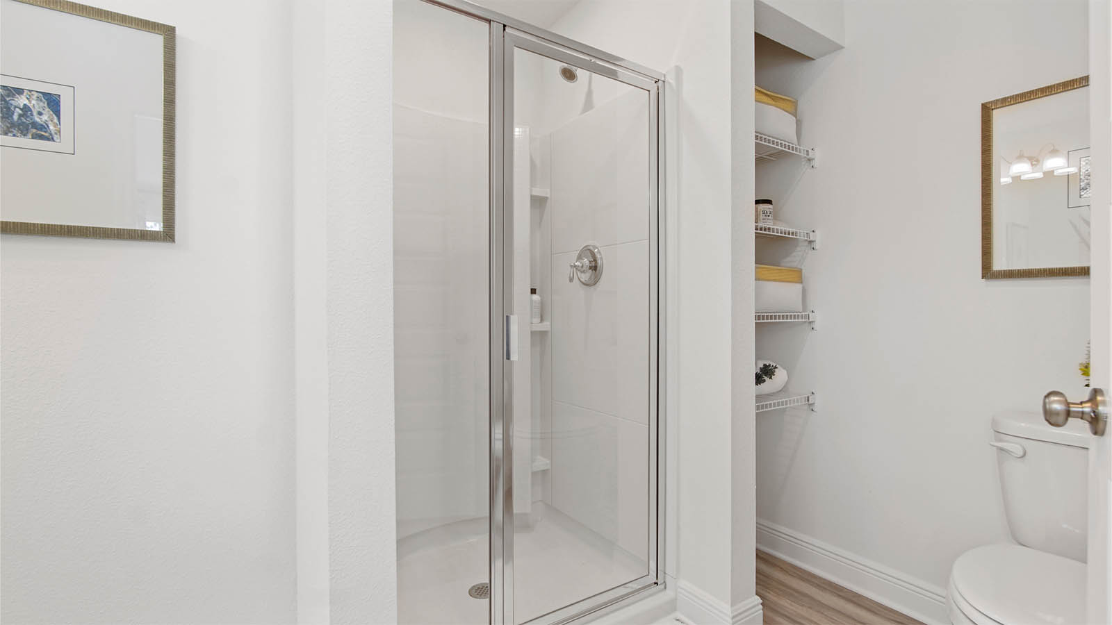 Primary bathroom with glass shower enclosure