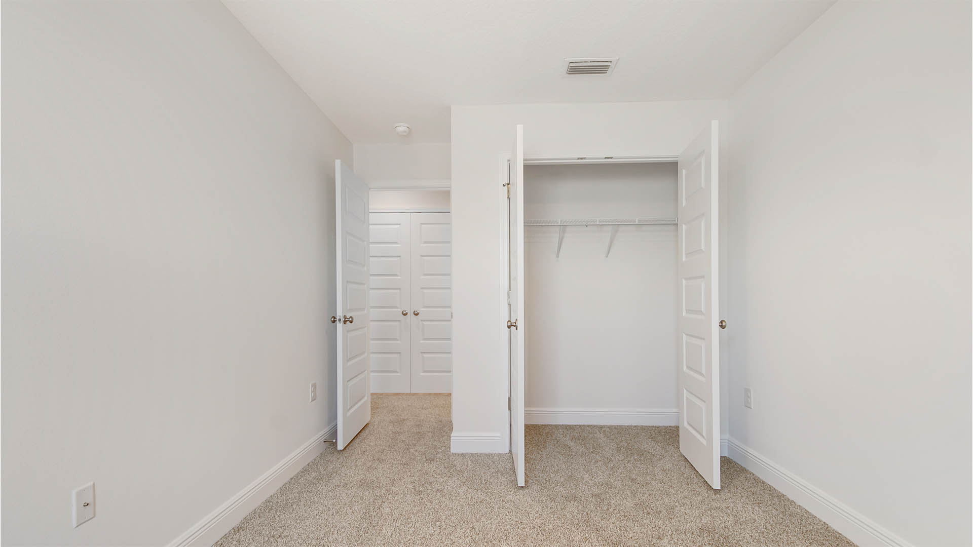 Bedroom 3 with carpet and spacious closet