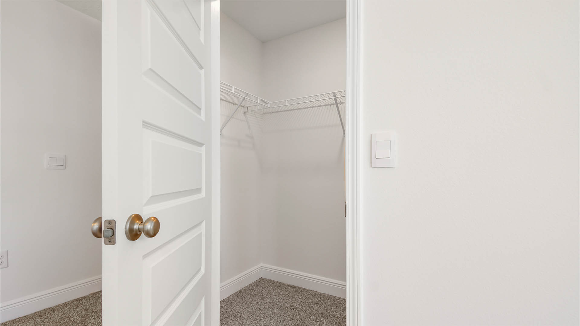 Primary bedroom closet with plenty of space