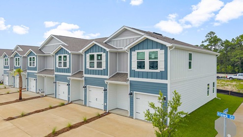The Palm Townhome Exterior six unit building with two exterior units and four interior units