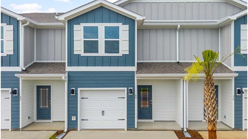 The Palm Townhome Exterior six unit building with two exterior units and four interior units