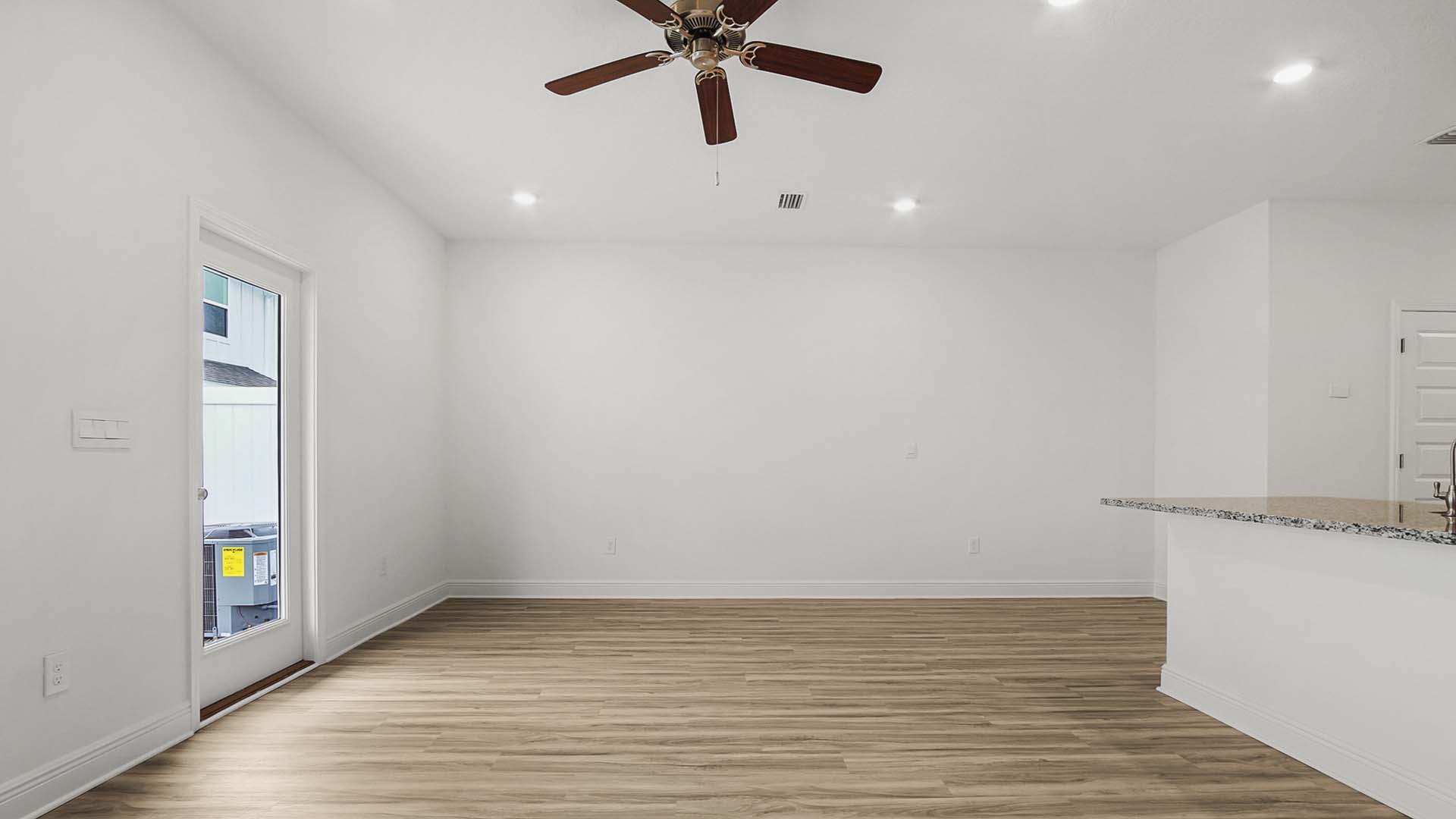 There is a dining area with access to the back patio