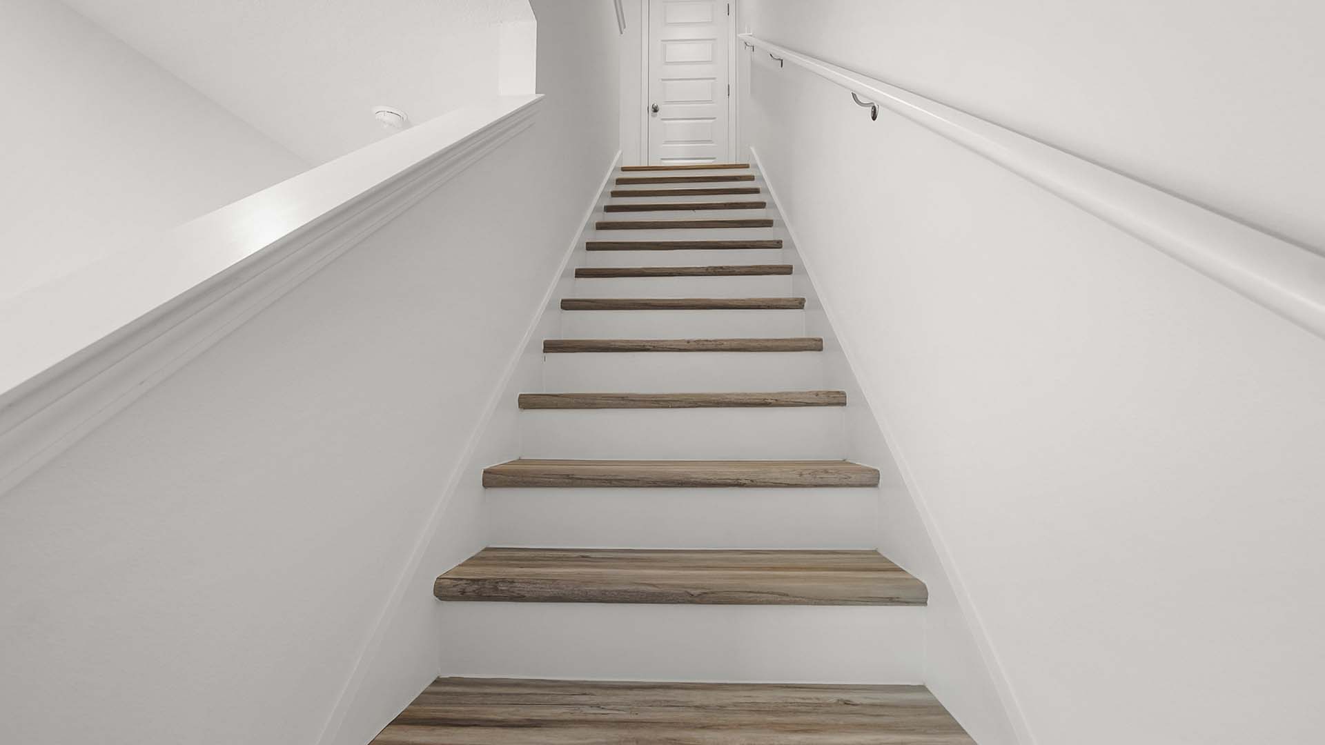 The stairs lead to all bedrooms on the second level