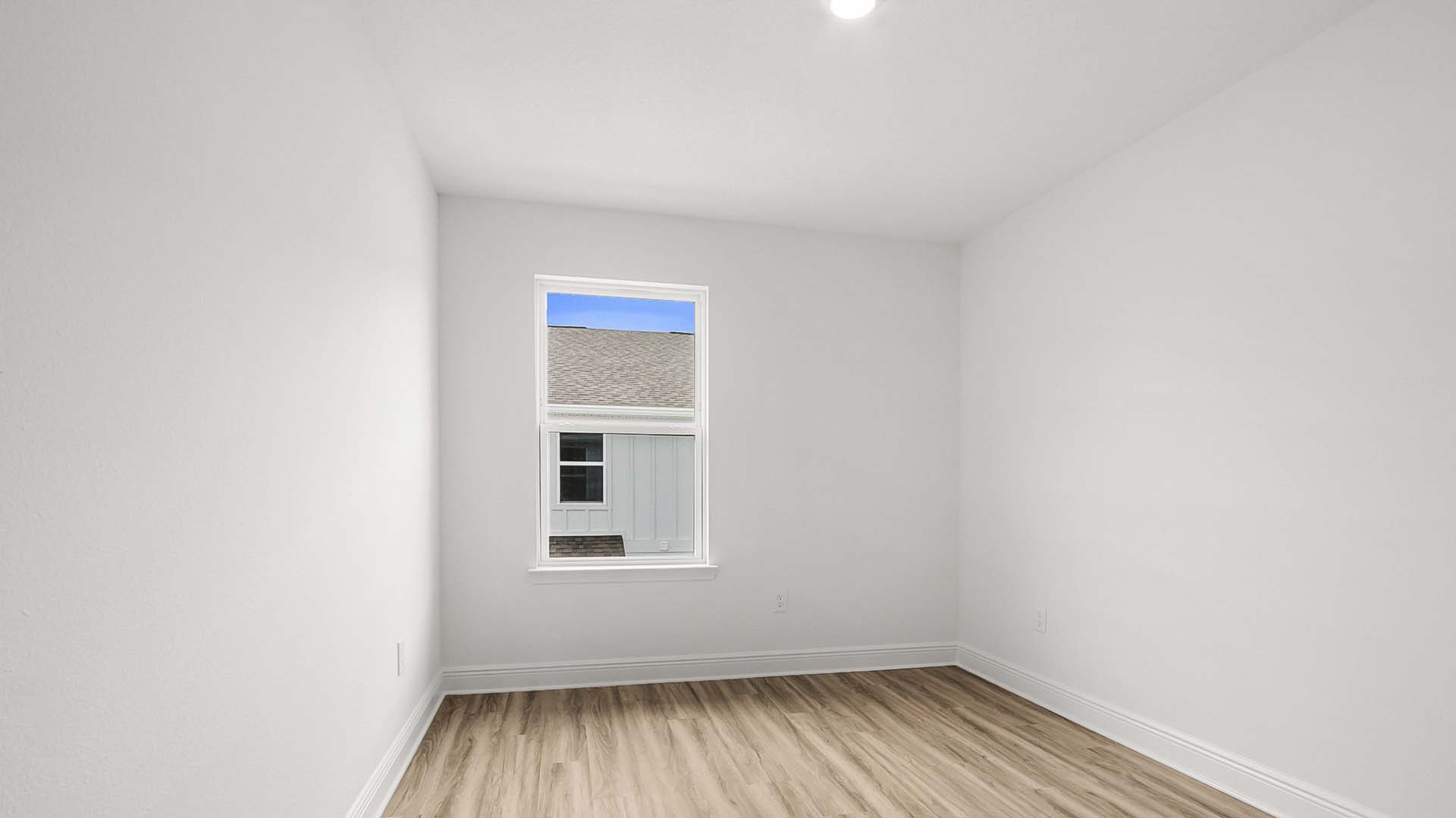 There are two guest bedrooms on the back of the second level