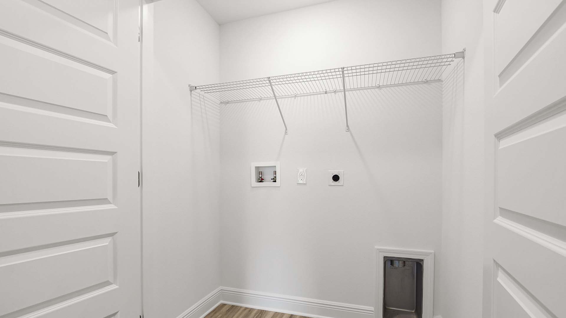 The laundry area allows for a full size washer and dryer