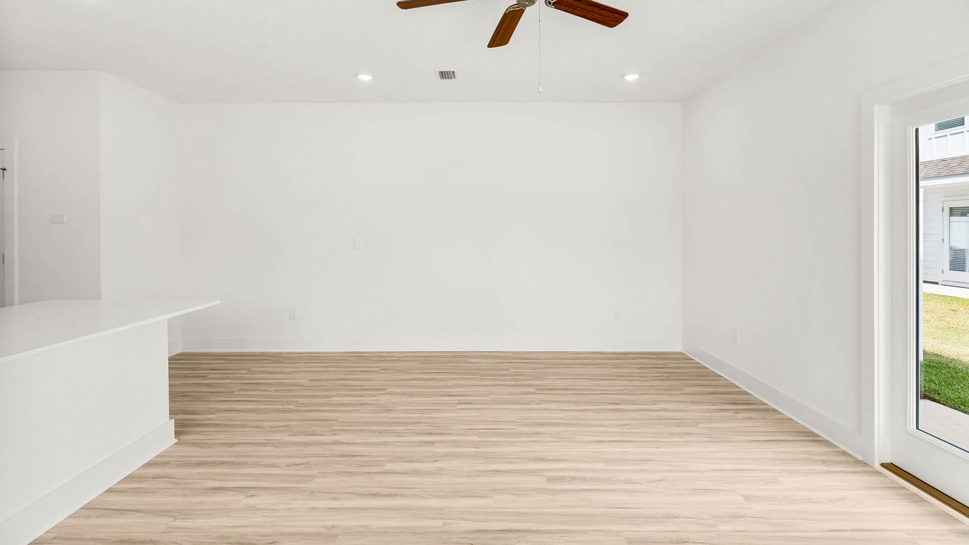 There is access to the back patio off the dining area