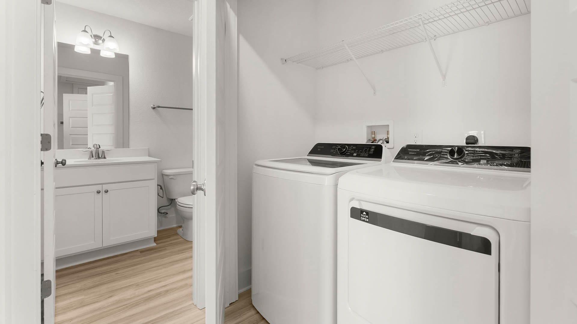 There is a laundry area just off the additional bedrooms that has space for a full size washer and dryer