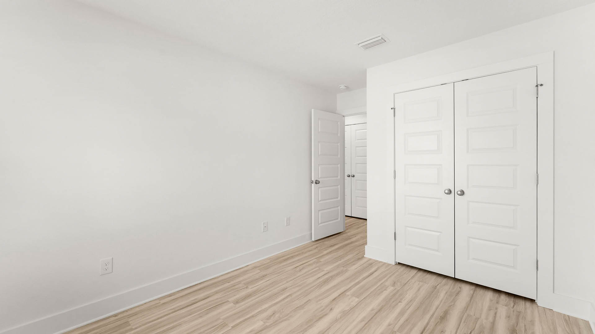 Additional bedroom two has EVP flooring