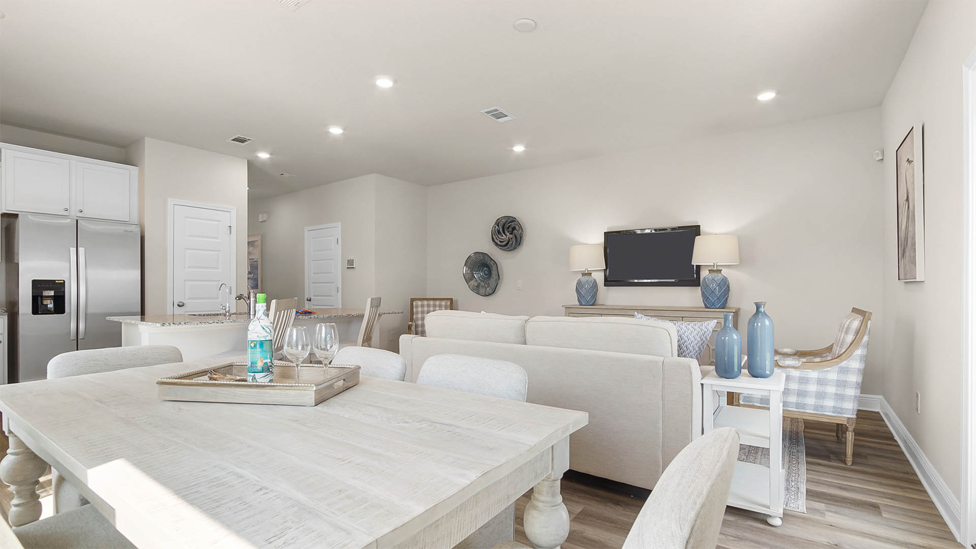 Dining room and living room with EVP flooring.