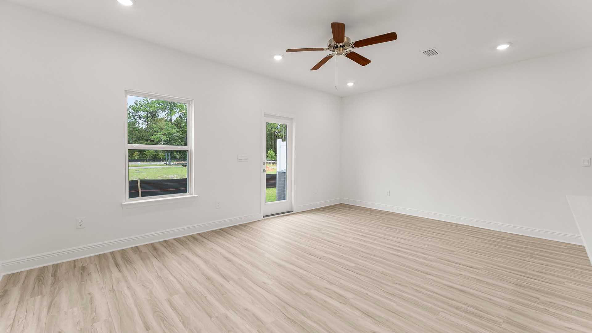 The spacious design of the living area allows for family and guests to interact comfortably