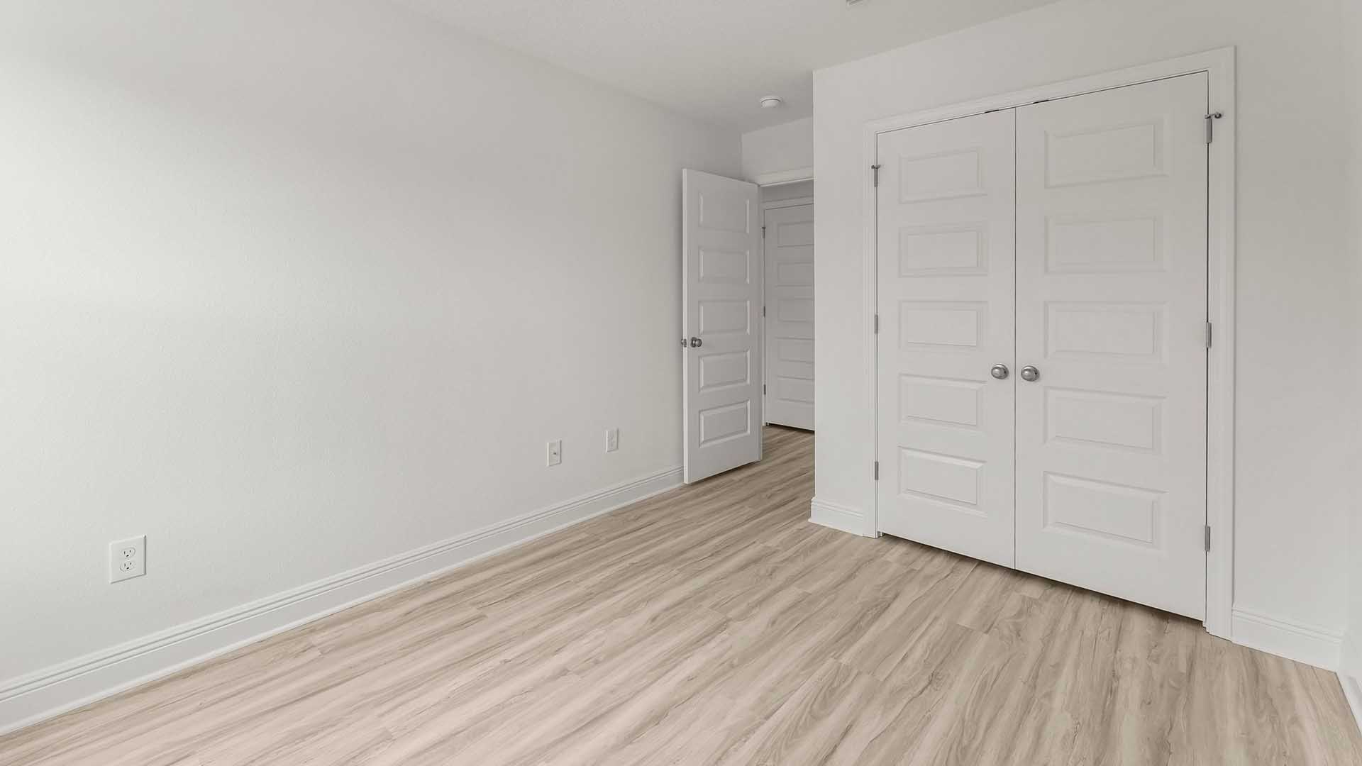 A shared bathroom is just off the additional bedrooms