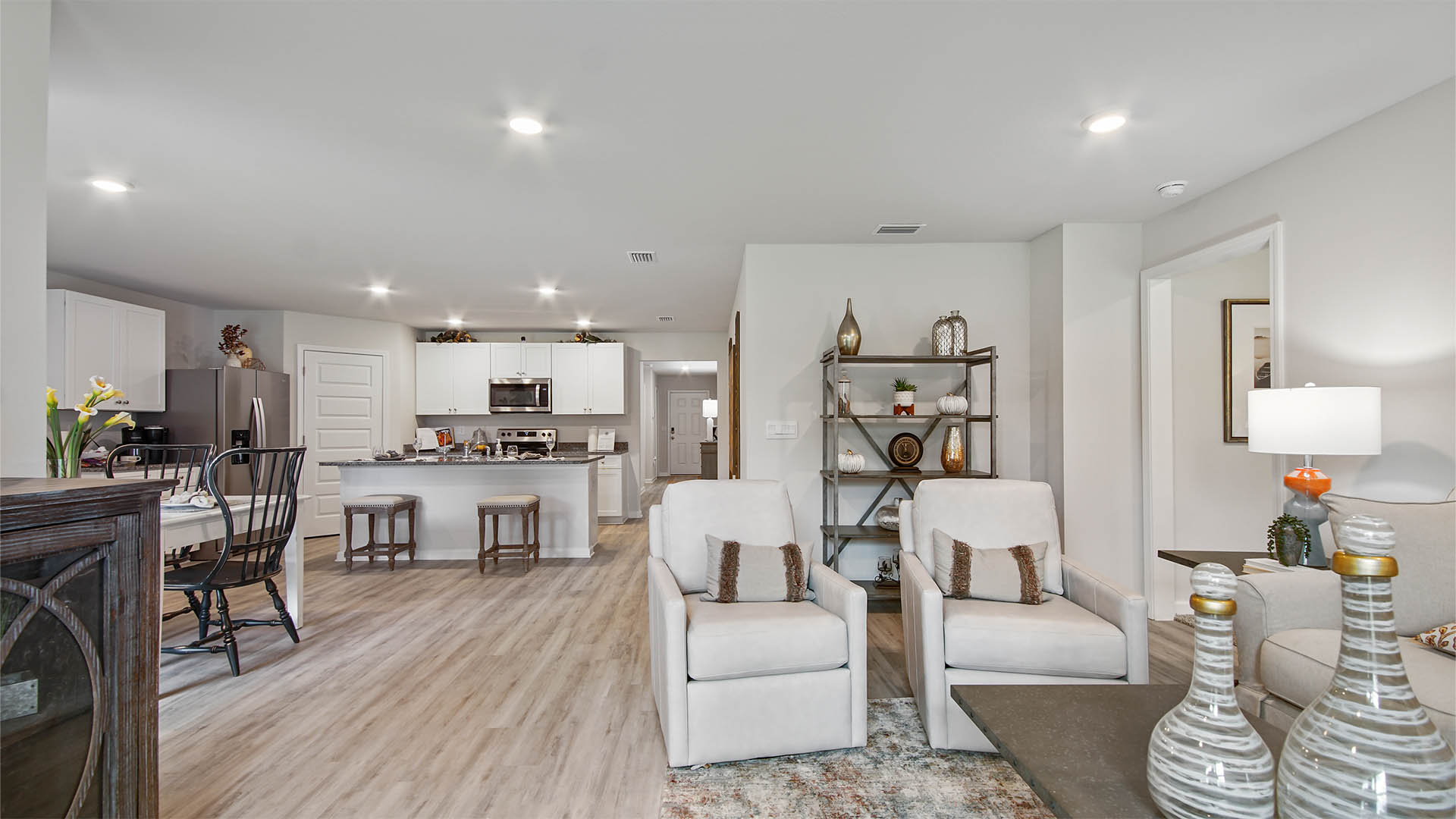 Living room and dining area facing the kitchen
