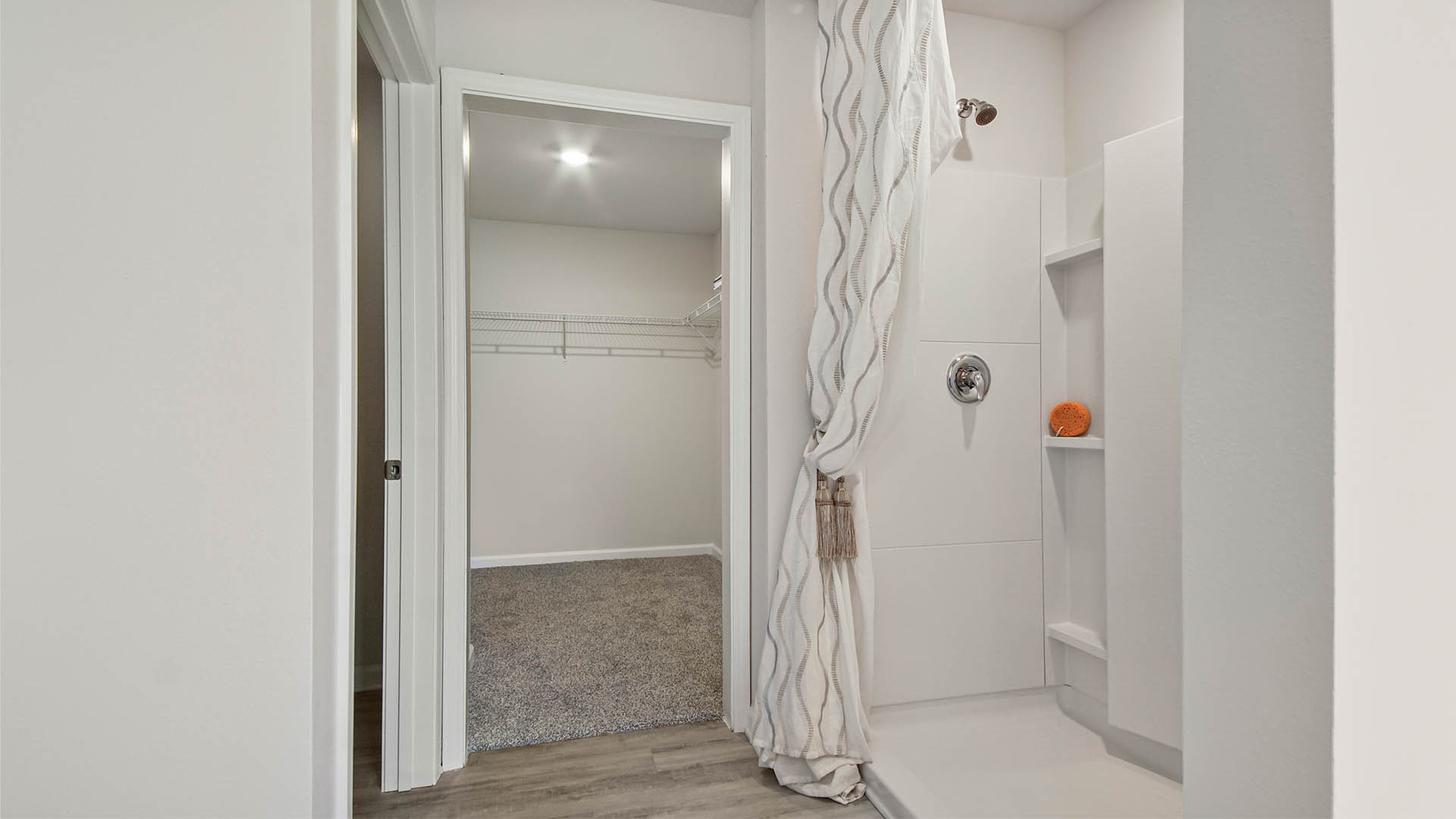 Primary bathroom with large shower and closet