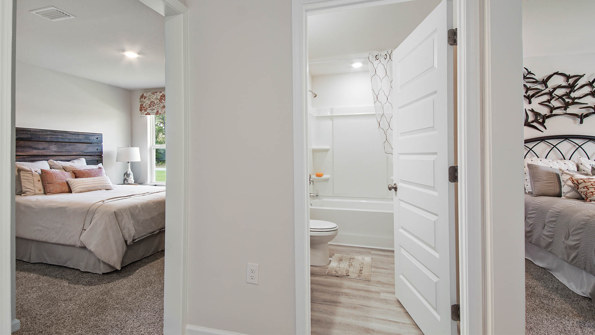 Two bedrooms off the foyer have the shared bath in between