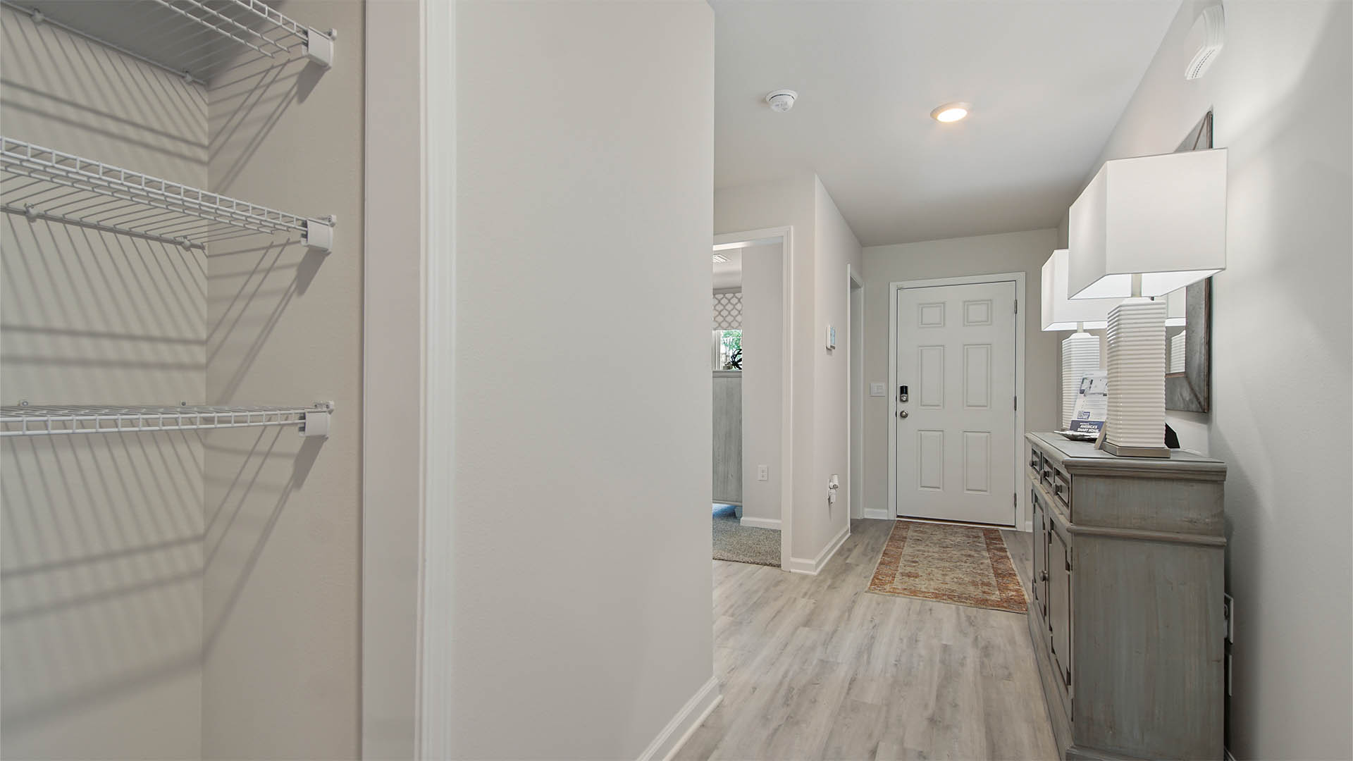 Foyer with a storage closet