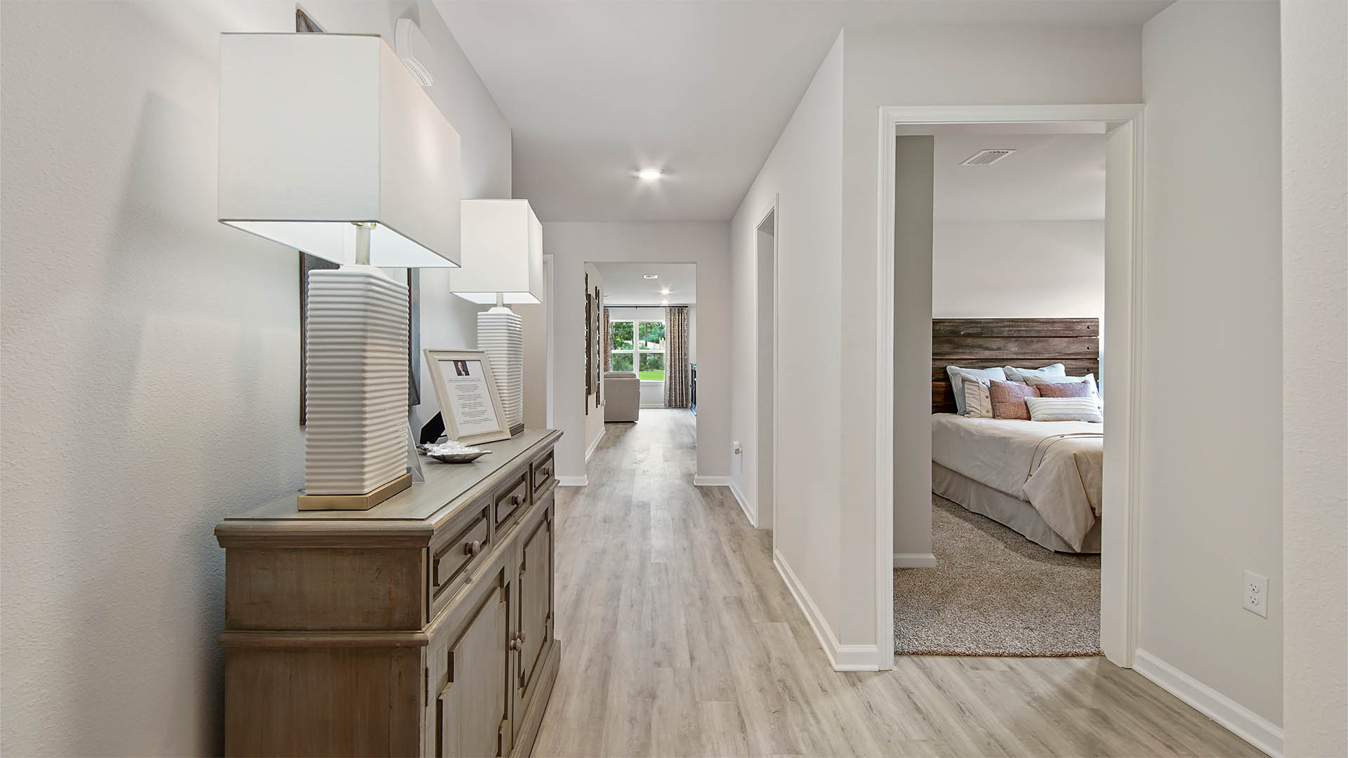 Entry hall to the main living area with three additional bedrooms