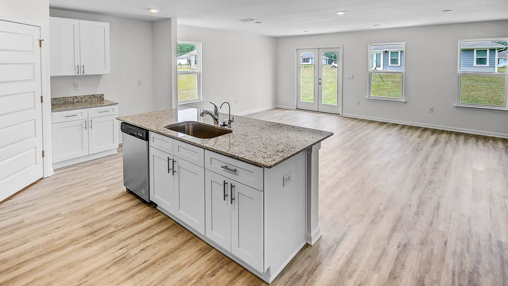Open Kitchen with EVP flooring and center island