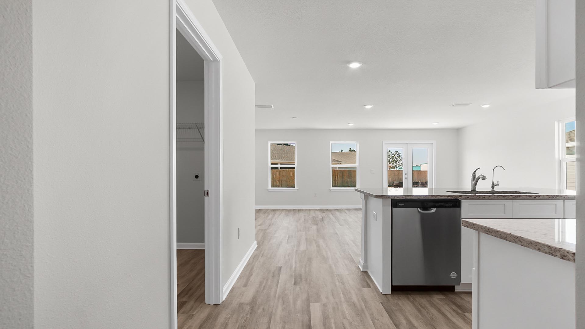 The entry hall leads to a spacious living area