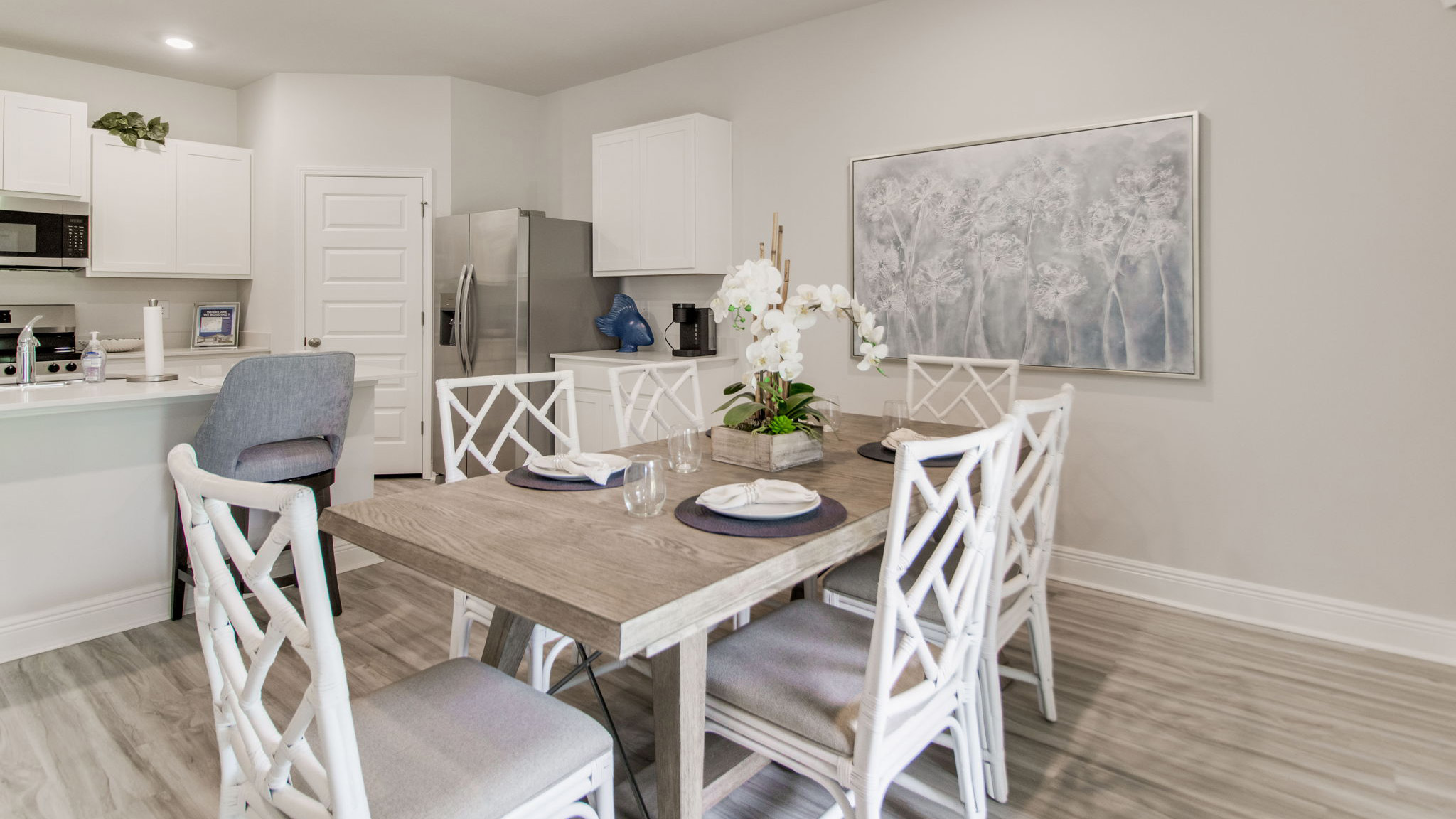 The dining area is adjacent to the kitchen