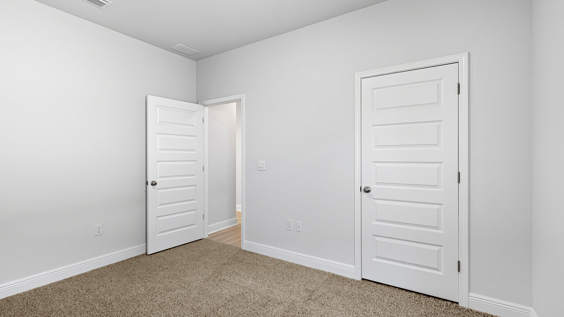 Bedrooms four and five are off the entry hall