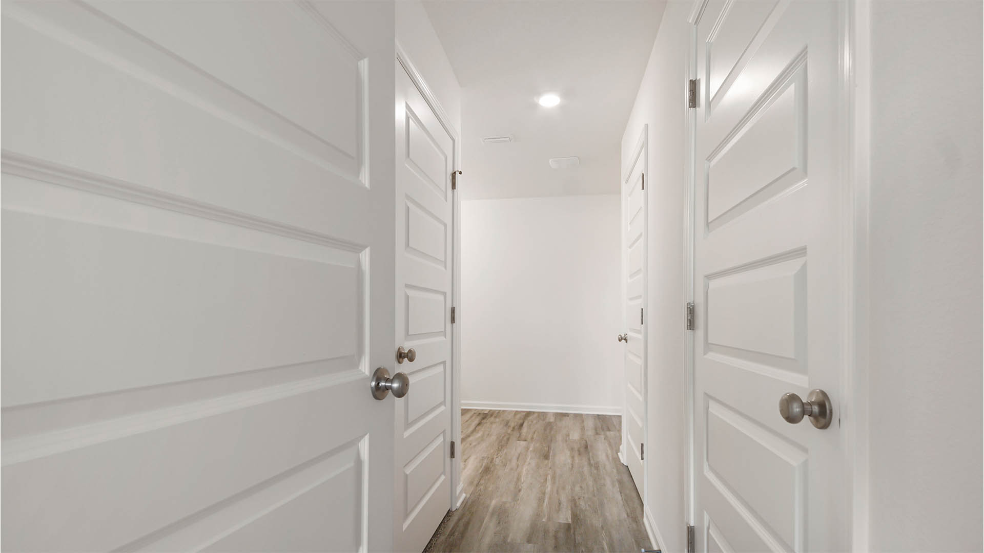 Hallway from bedroom four back to the foyer
