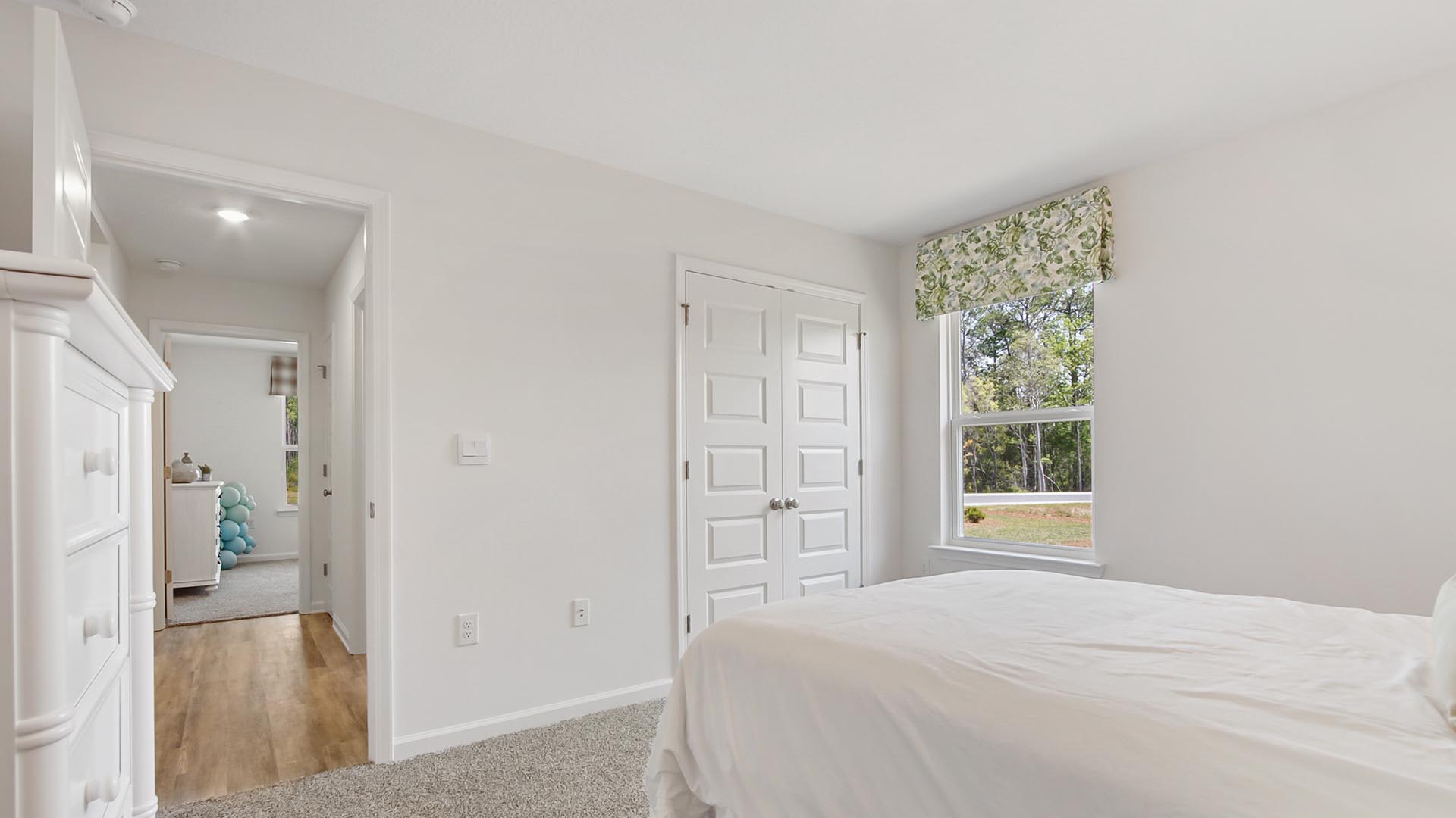 Bedroom three features a spacious closet