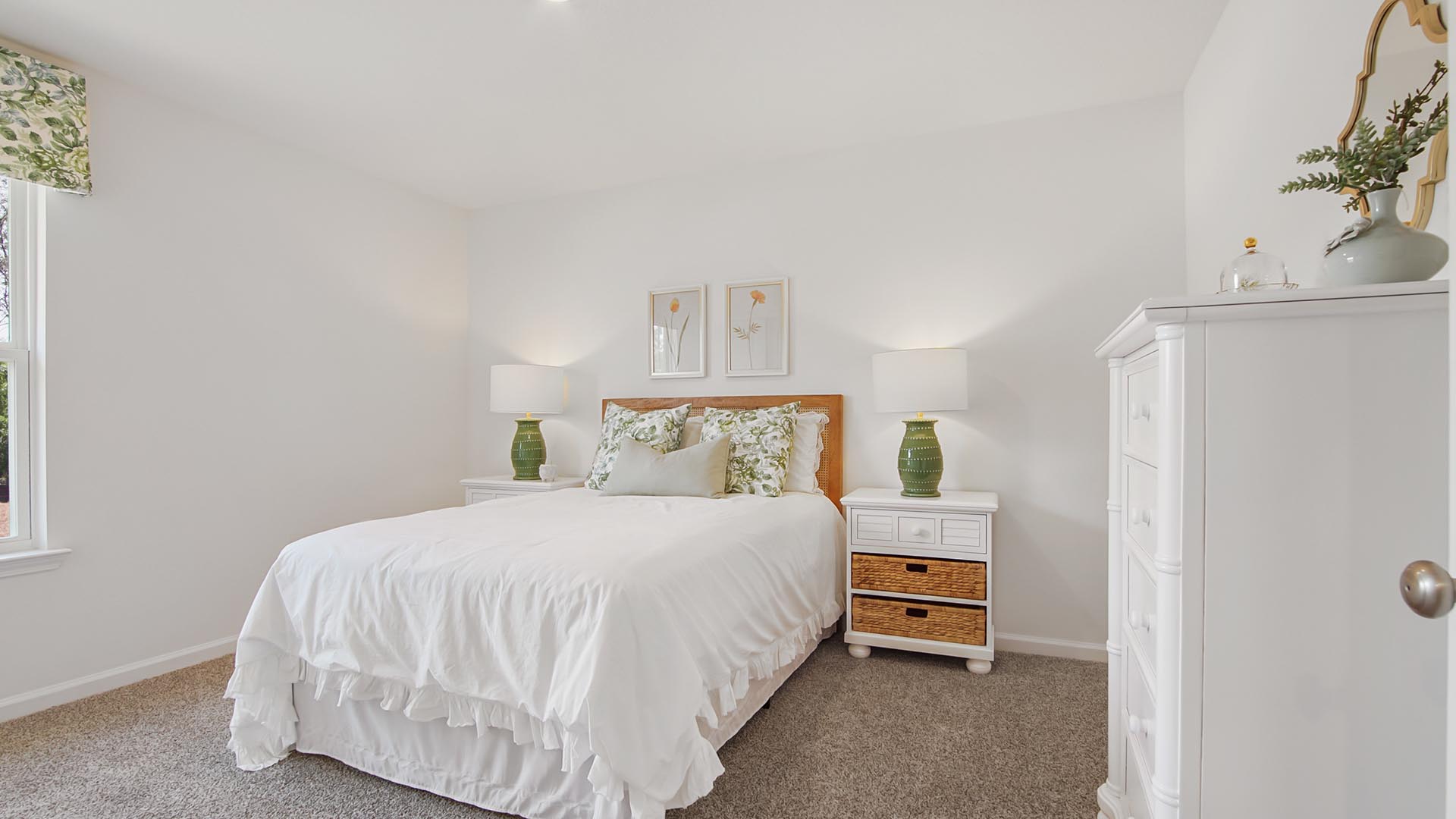 Bedroom three is spacious and features plush carpet