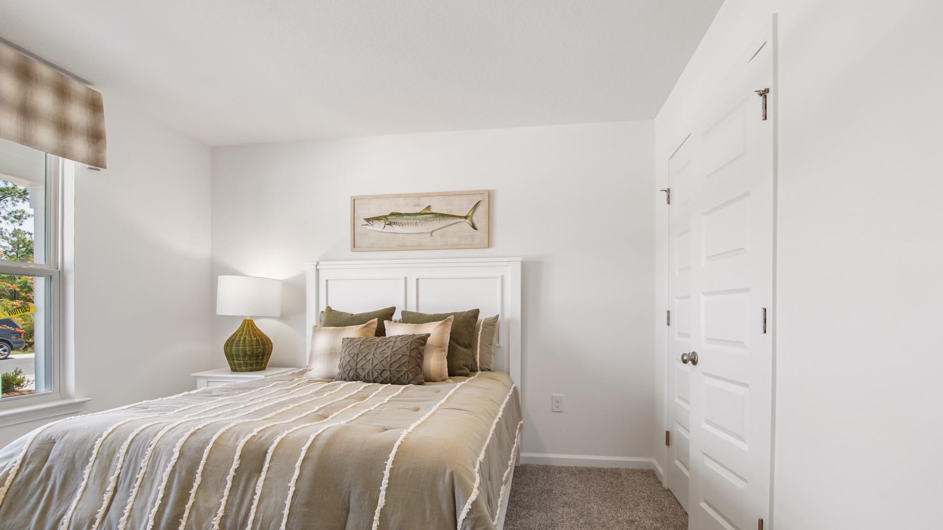 Bedroom two is located at the front of the home and could be used as an office