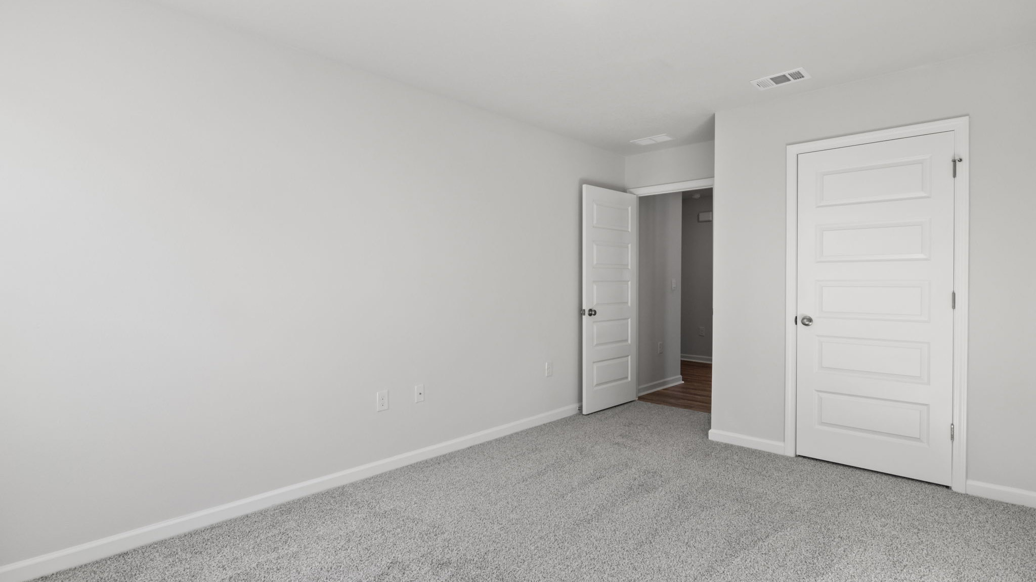 Guest bedroom three has carpet