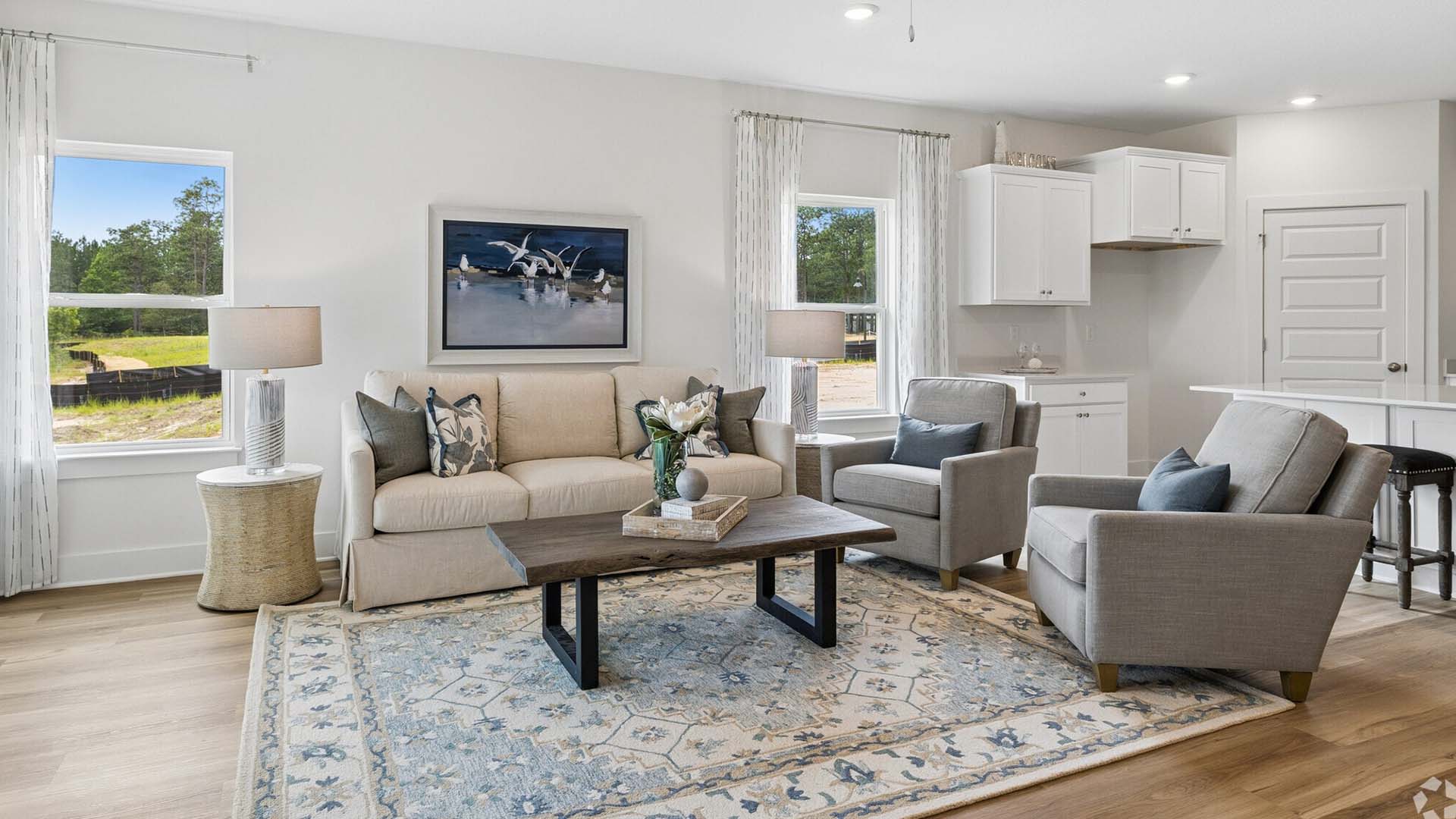 This image shows the staged Riverside model with EVP flooring throughout the main living area