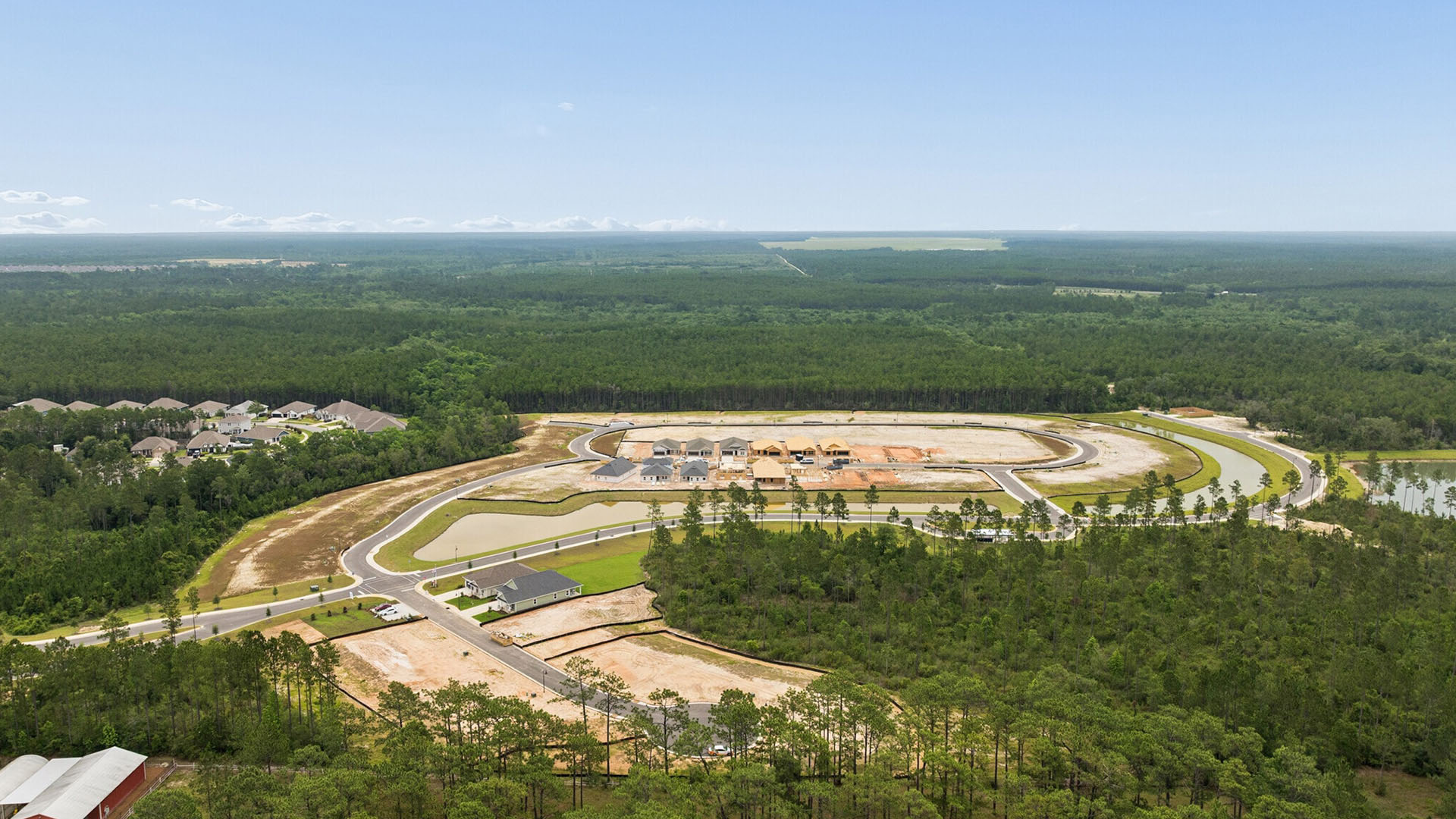 Aerial view of the newest phase of Ashton Park. This section has pond views from select homesites
