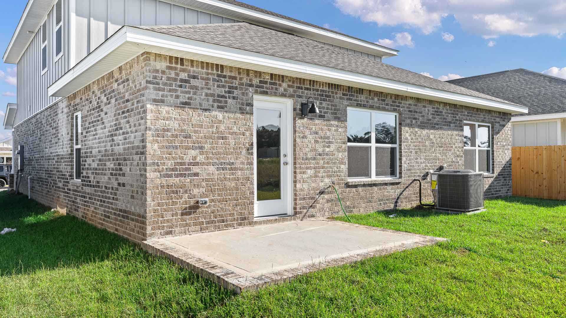 There is an open patio on the back of the home