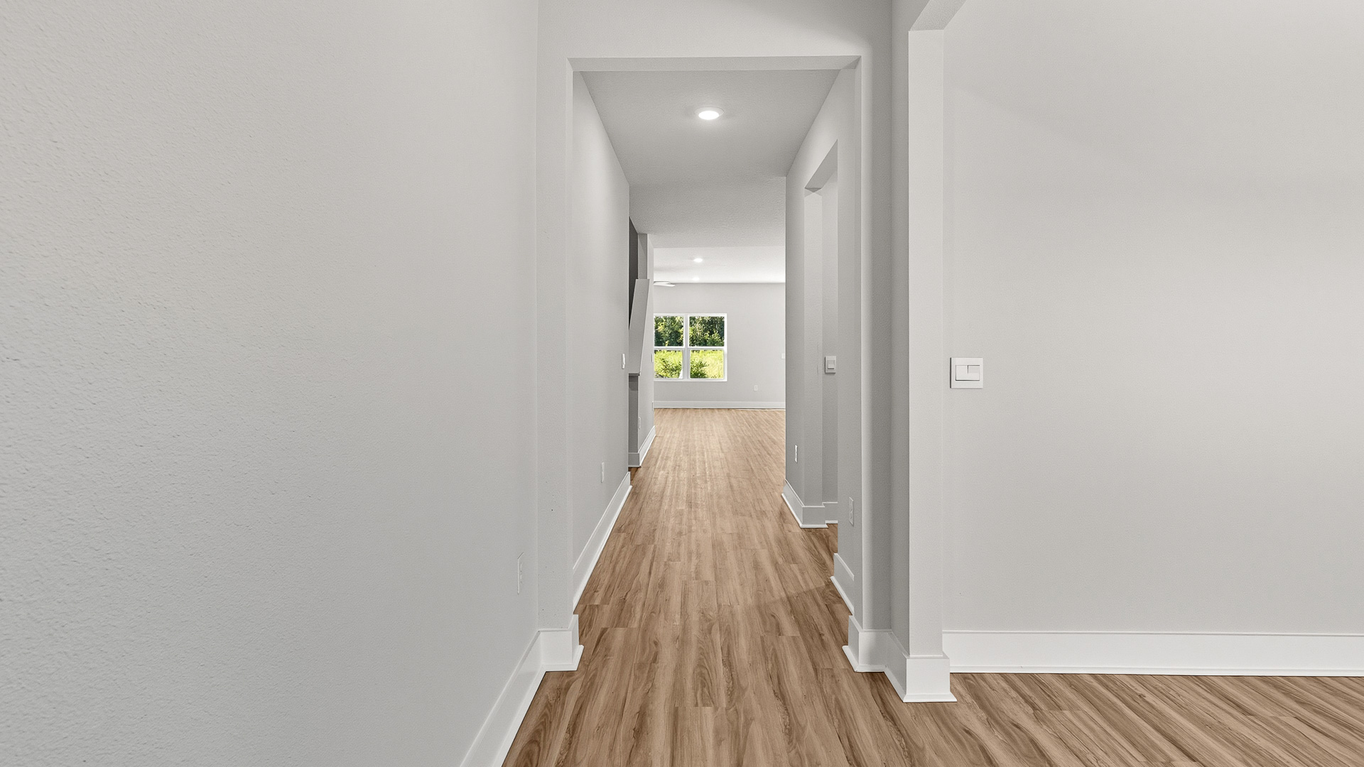 Inside there is EVP flooring leading through the foyer