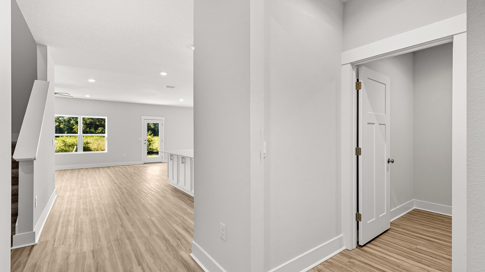 The laundry is on the main level off the foyer it has a coat storage closet