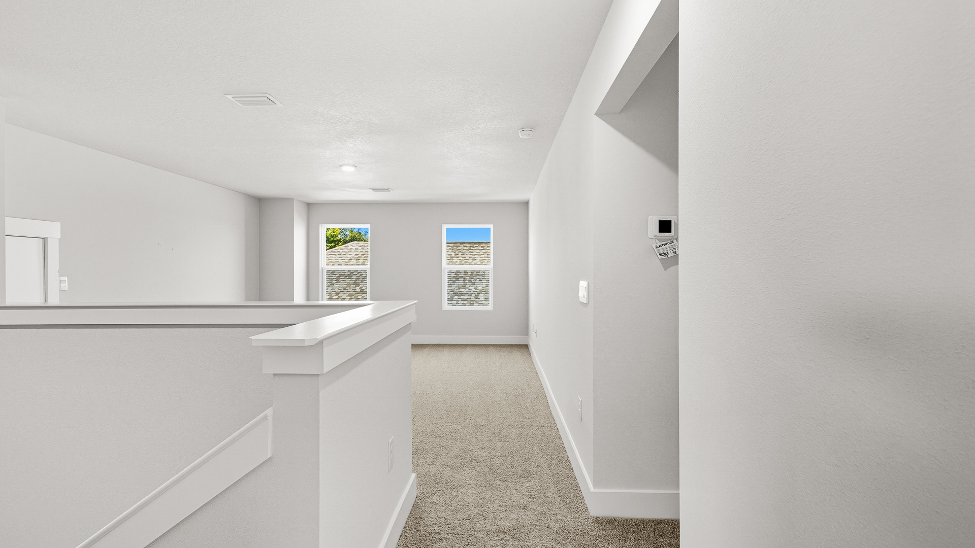 There is an additional living space on the second level with carpet