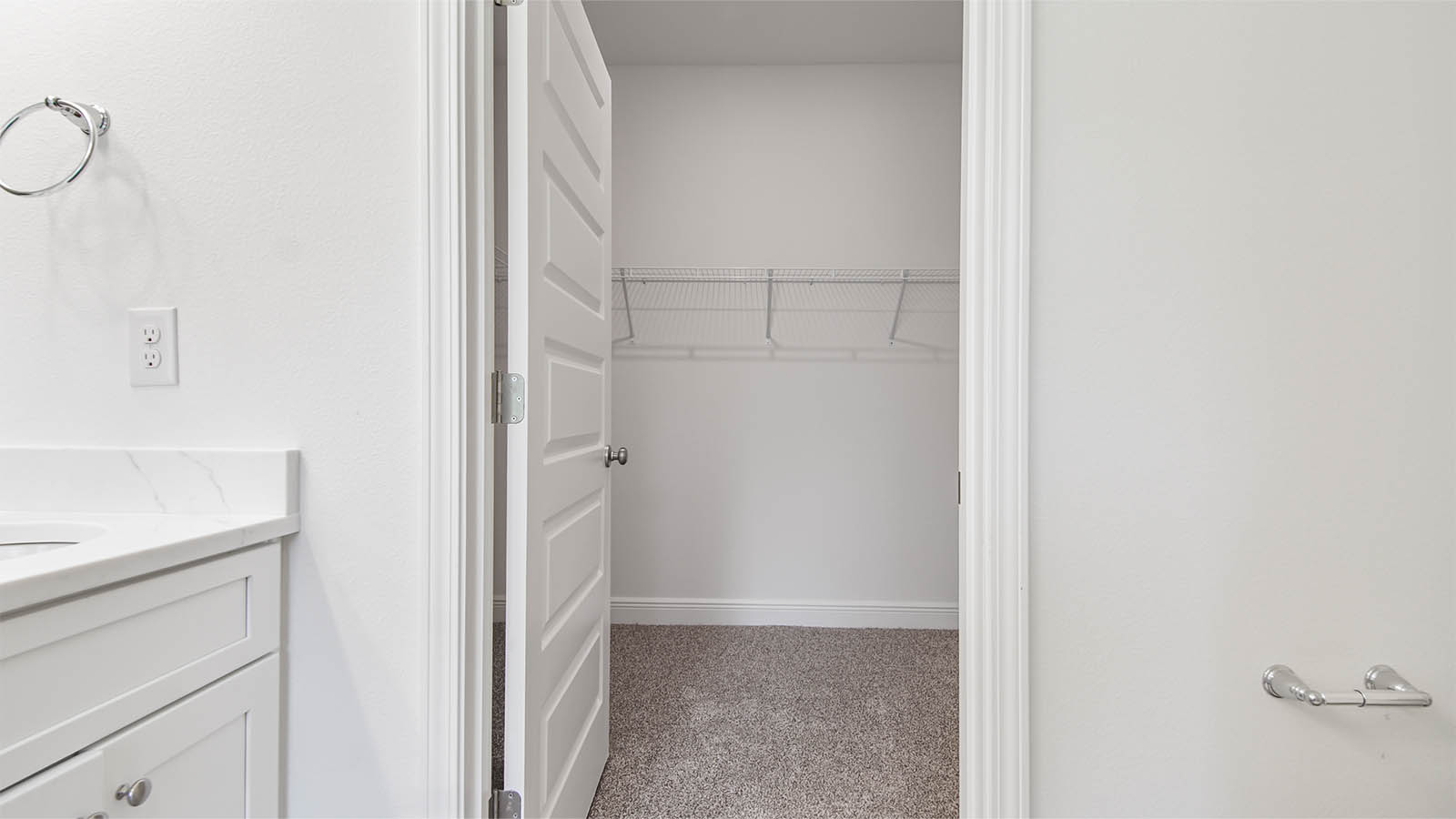 The primary bathroom has a large closet