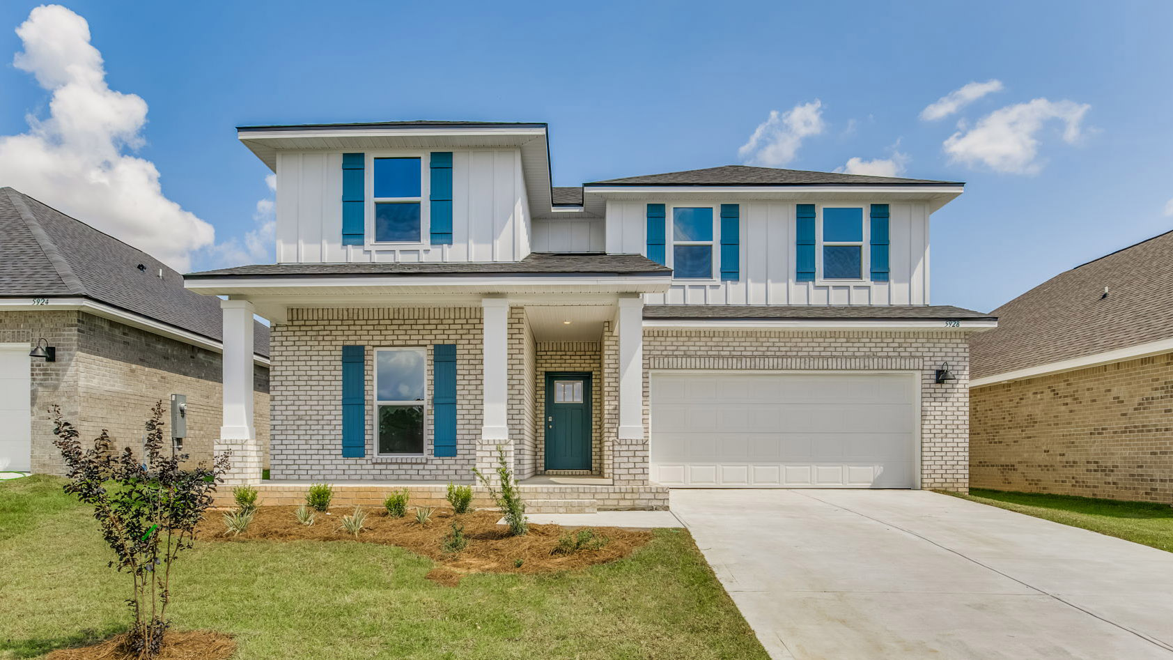 126 Foxtrail Run is under construction and features the Ozark. The exterior has a brick front on the main level and Hardie siding on the second level