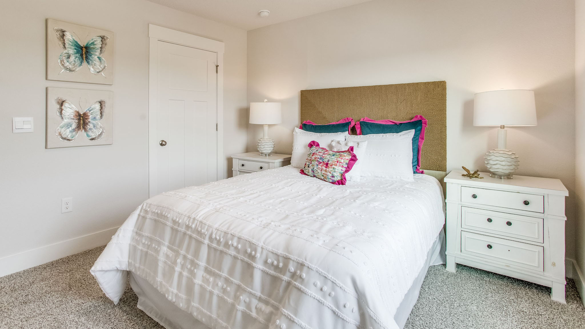 The upstairs bedrooms overlook the front of the home