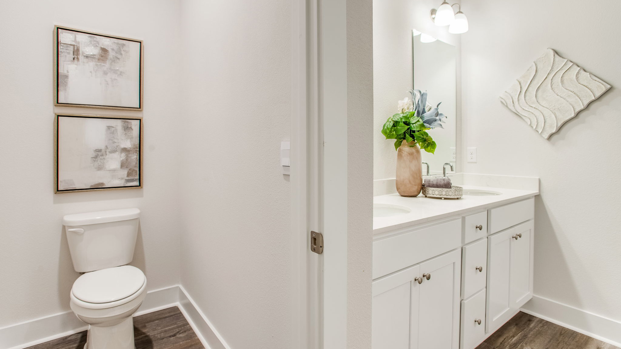 There is a separate water closet for privacy in the primary bathroom