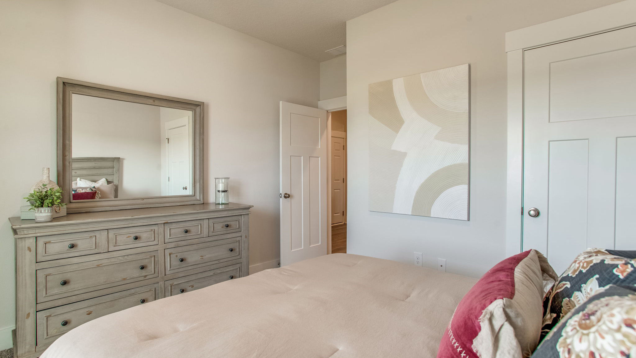 The main level guest bedroom has carpet