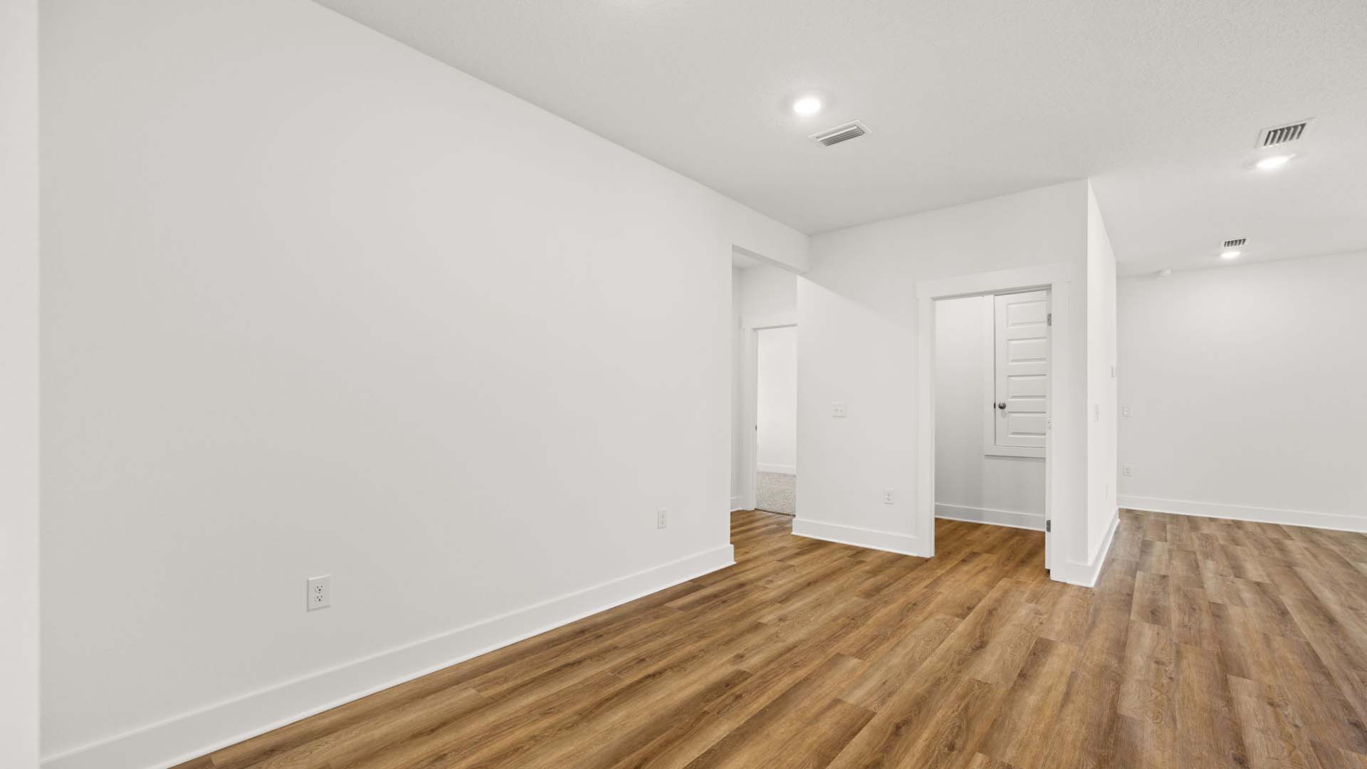 The dining area is adjacent to the kitchen